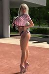 Hot 3d blonde with huge breasts posing outdoors