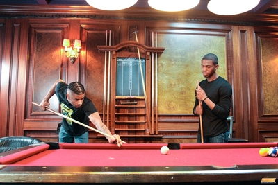 At the pool hall downtown, late night, Jin Powers and Krave Moore have a score to settle.  They