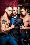 Sugar Daddy Adam Russo doles out cash to Wolf Hudson as they\'re setting the mood and getting ready for a night of drink, cash and kink, featuring 3 sided debauchery. Currency flies as JD Phoenix dances for Adam, shaking his tight wazoo in his blue and whi