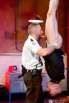 Jessie Colter hangs from the ceiling by his ankles, like a side a beef. He's erect, in nature's garb beneath the waist but encased in a straitjacket above. Uniformed interrogator Dirk Caber calls him a malefactor. Caber looks sizzling with a whole beard f