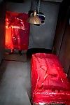 Jesse Santana is splayed out on the prison mattress and wrapped in red plastic. His ass is put up and immobilized. There\'s a man standing nearby, also encased in plastic. His knob is erect because the tough want to fuck the ass previous to him. The standi