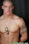 We're also loading up a type new scene to the web gallery tonight -- a special solo with the muscular dreamboat Tanner. That appealing devil has a body to kill for and this dude puts on a special show for us in this specially-shot uniformed solo tonight. 