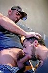 Damien Crosse leans against a wall in a shady alley, his taut bicep showing off a raw tattoo. A tag on slides across his motorcycle. Damien\'s knob springs to attention in his jeans and he massages his growing boner. The tag on is Nick Cross, arms swirli