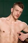 Caleb Slaver and Adam Ramzi sit naked, making out and jacking each other's hard dicks. Caleb asks for for more every time Adam teases his pierced nipples. Both studs are merely the right amount of furry, slim and athletic. Caleb eagerly services Adam's pe