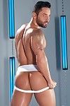 Tatted hunk Bruno Bernal hovers naked over Fabio Acconi working out his cock and nibbling his nipples. Once Fabio's cock is at full mass and hardness, he directs Bruno's head down to the vivacious member. Bruno swallows it whole, burying his nose in Fabio