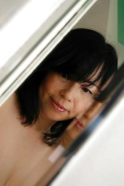 Japanese MILF Norie Shibamura undressing and widening her wavy lower than lips