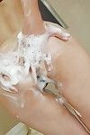 oriental model Tomomi Sone enchanting washroom and exposing her goods in close up