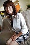 Chinese lass Kimie Kuwata undressing and exposing her goods in close up