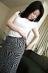 Eastern MILF Misuzu Masuko undressing and expanding her clits in close up