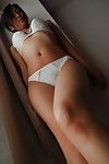 Japanese MILF Ryoko Morikawa undressing and exposing her wavy gash in close up