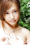 Oriental juvenile model Reika Shina uncovering her miniature mambos and bushy twat