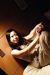 Oriental juvenile Hinako Muroya undressing and exposing her goods in close up