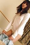 oriental youthful in nylon knee socks undressing and exposing her uterus in close up