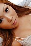 Japanese adolescent Rika Watanabe undressing and exposing her drenched vagina in close up