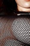 Bosomy eastern pretty with curly cum-hole posing in sheer outfit and