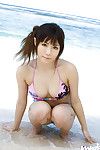 Curvy Chinese beauty with nice anus Aya Hirai slipping off her bikini outdoor