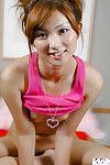 Loveable oriental amateur doll leisurely uncovering her miniature changes direction