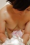 Lusty oriental MILF gives a soapy hand and a juicy dick sucking in the washroom - PornPics.com