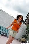 бессердечный Китайский лесси в Мини-юбка Раскрывая ее огромный Привыкли фрикадельки