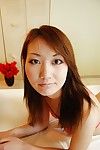 Cheery Chinese youthful Kazuha Kimura undressing and toying her unshaved pussy