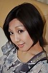 Beautiful Japanese MILF Mayumi Iihara undressing and jerking off her muff