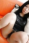 Sassy Japanese MILF undressing and amplifying her unshaved wet crack in close up