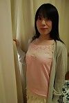 Shy Japanese bombita with bushy pubis gets undressed down and has some gentile vibing liking