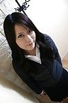 Shy Chinese MILF in suit clad undressing and exposing her unshaved gash