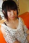 Shy Japanese infant with slim bends undressing and vibing her love-cage