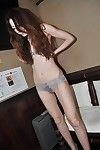 Skinny oriental MILF Ryoko Matsuzaka undressing and playing with a fake penis