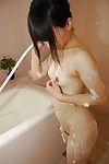 Slippy Japanese infant winsome bath and exposing her hirsute gash in close up