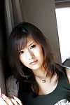 Adorable Japanese lass Sara Tsukigami uncovering her seductive stoops