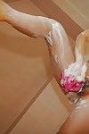Appealing Chinese amateur pleasing baths and exposing her soapy goods