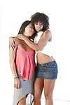 Swarthy and Japanese lesbos Misty Stone and Angelina Chung tongue giving a kiss