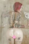 Hot redhead Anna Consternation Peaks window-dressing tattoos with the addition of obese bosom yon shower