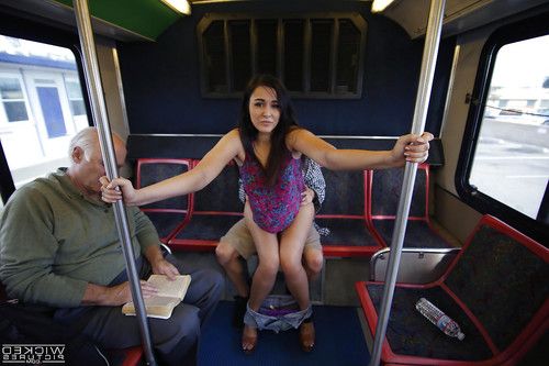 Brunette exhibitionist Anastasia Black giving a blowjob on public bus