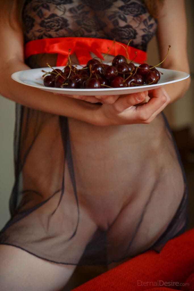 Tiny Euro teen Mila eats cherries after removing them from her wet pussy