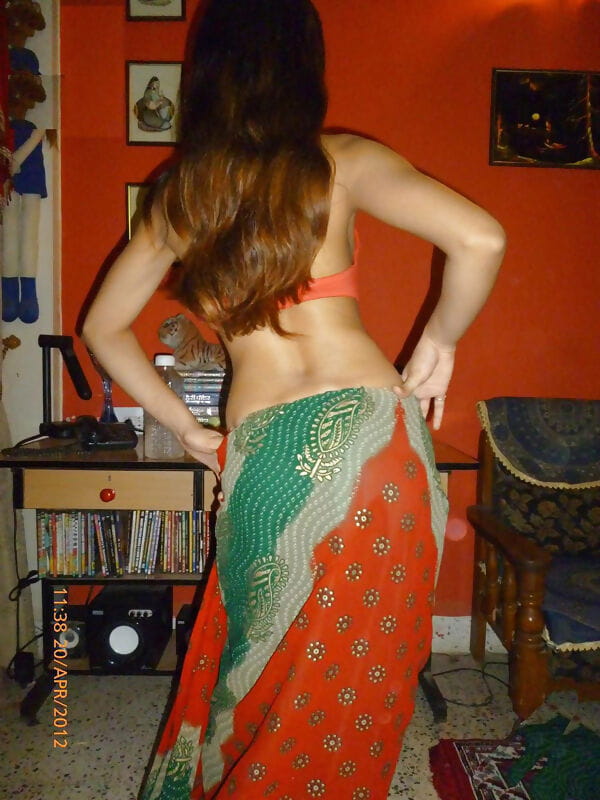 Indian solo girl slides upskirt panties aside before showing her bare breasts