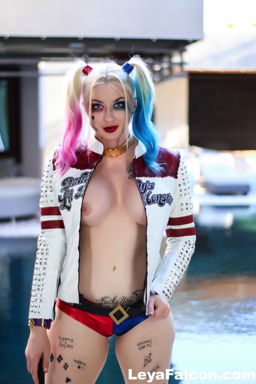 Solo girl Leyla Falcon models next to a pool in a cosplay outfit
