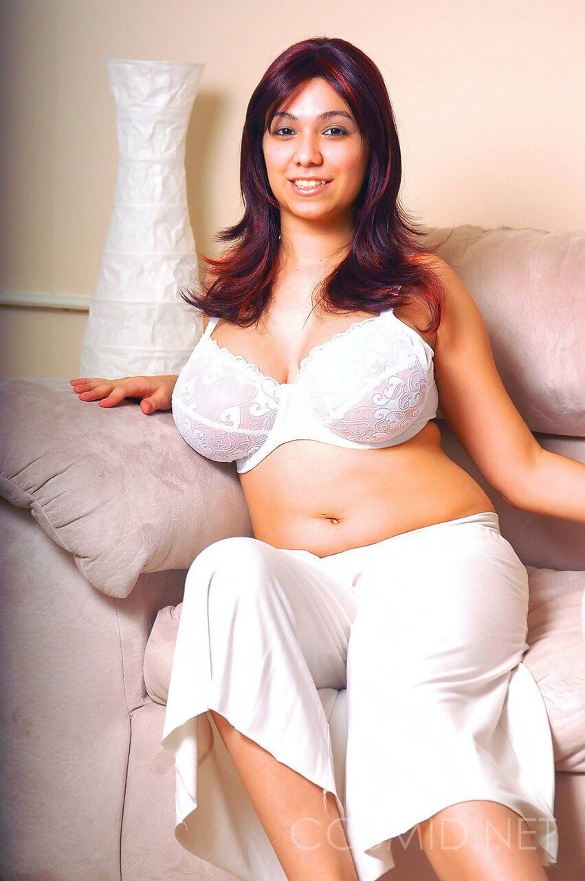 Sexy dark haired Elizabeth modeling her massive fatty tits in white lace bra