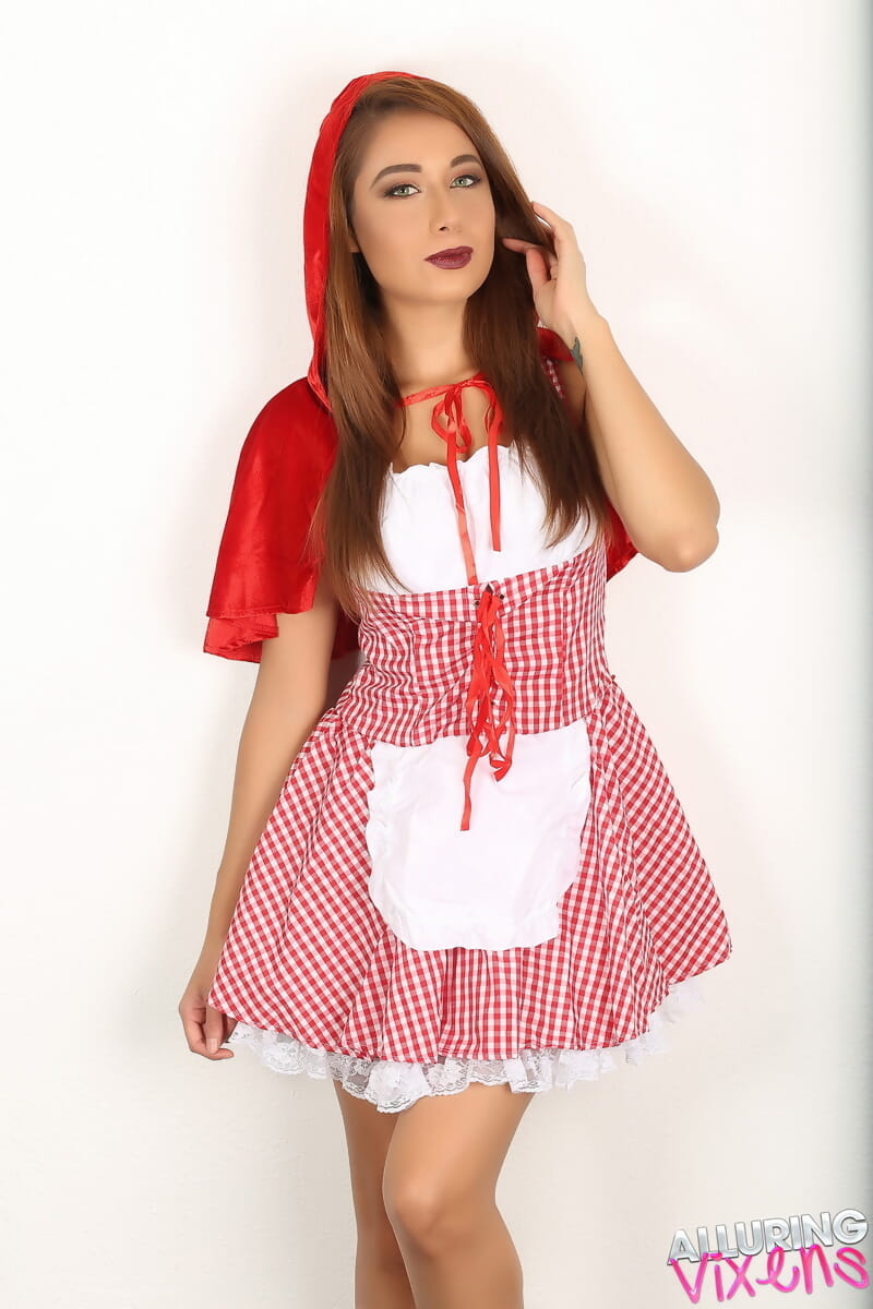 Cute girl Lilly flashes a no panty upskirt in Little Red Riding Hood outfit