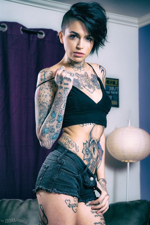 Leigh raven exposes her inked body in the living room
