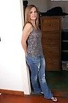 Adorable amateur in blue jeans undressing and playing with herself