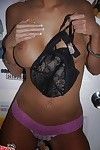 Seductive amateur with big round tits slipping off her lingerie