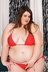 Sexy fatgirl saphire strips off her red bikini and spreads her l