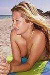 Beautiful young gf shows her tits on public beach