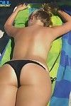 Awesome blonde with nice ass poses on public beach