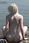 Beautiful blonde coco is caught posing naked on a public beach