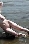 Beautiful blonde coco is caught posing naked on a public beach