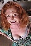 Mature redhead girl with big boobs Veronica spreading her tight pussy